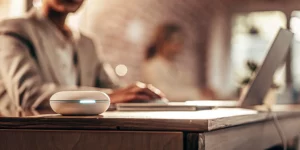 AI voice assistant on desk.