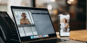 Automated call answering service on laptop and smartphone.